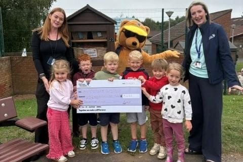 £9400 donation backs playgroup's community growing project