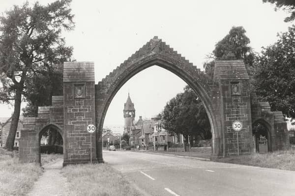 The Dalhousie Arch at Edzell, completed in 1887, was built to commemorate the 13th Earl of Dalhousie and his wife. The photograph was probably taken in the '60s or '70s, judging by the Morris Minor Traveller parked nearby.
