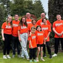 ​Holly is pictured with her mum Carly and the other family members who took on the walk.