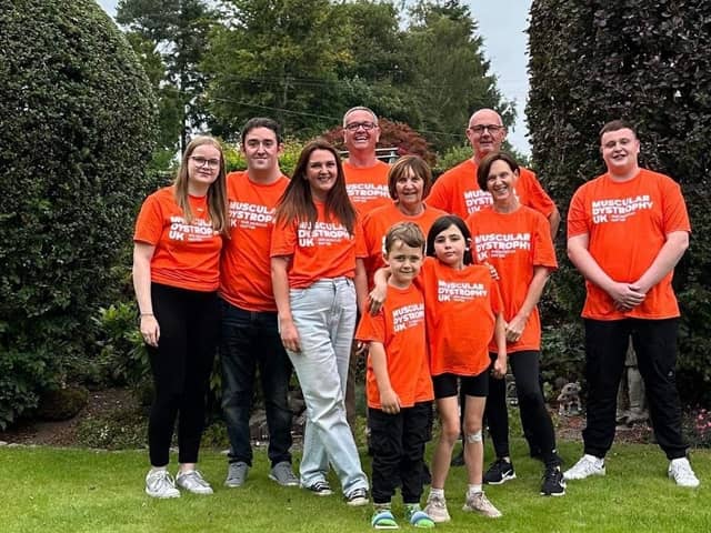 ​Holly is pictured with her mum Carly and the other family members who took on the walk.