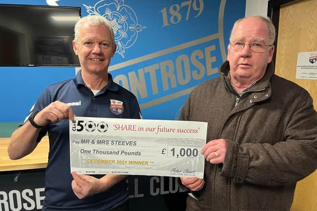 Club chief executive Peter Stuart presents the cheque to Bruce Steeves.