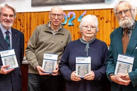 ​Pictured at the launch are local historian Norman Atkinson; Dr Norman Reid, Strathmartine Press; author Dr Ishbel Barnes and Ron Wilson.