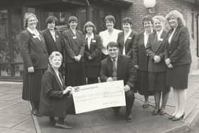 ​In 1994, a cheque for £1000 was presented at Forfar Nursing Home to Alzheimers Scotland by staff of Grampian Care Nursing Homes in Scotland. With the cheque were Hazel Scott and Richard Swan, and staff members from Forfar, Montrose, Arbroath, Falkirk, Glasgow, Cumbernauld and Glasgow.