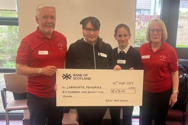 The girls presented their cheque at a recent Carnoustie Memories meeting to Craig Murray and Lorraine Young.