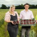 Growers and Owners Jennifer Marshall and Rowan Marshall with Asda Produce Colleague Martin Ferguson