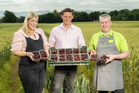 Growers and Owners Jennifer Marshall and Rowan Marshall with Asda Produce Colleague Martin Ferguson