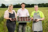 Growers and Owners Jennifer Marshall and Rowan Marshall with Asda Produce Colleague Martin Ferguson