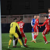 Matty Allan heads the ball across goal during the victory over Peterhead. Picture by Phoenix Photography