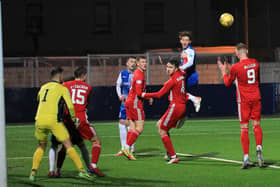 Matty Allan heads the ball across goal during the victory over Peterhead. Picture by Phoenix Photography