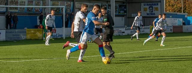 The Forfar backline ensure there's no way through for the Blues. Pic by Bill McCandlish