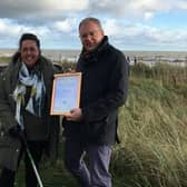 Carnoustie resident Rhona Hunter receives her award from Barry Fisher, Keep Scotland Beautiful CEO.