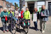 ​The knitters are pictured taking a break during their journey.