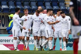 Montrose players celebrate Ross Campbell's winner in the weekend's rout. Pic by Michael Gillen