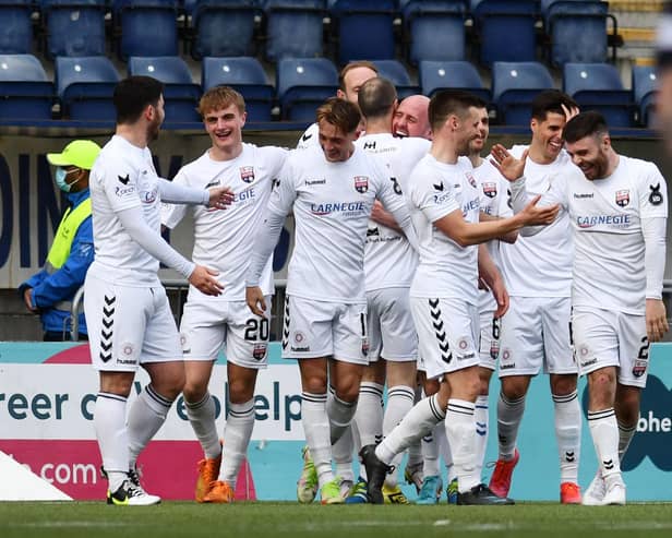 Montrose players celebrate Ross Campbell's winner in the weekend's rout. Pic by Michael Gillen