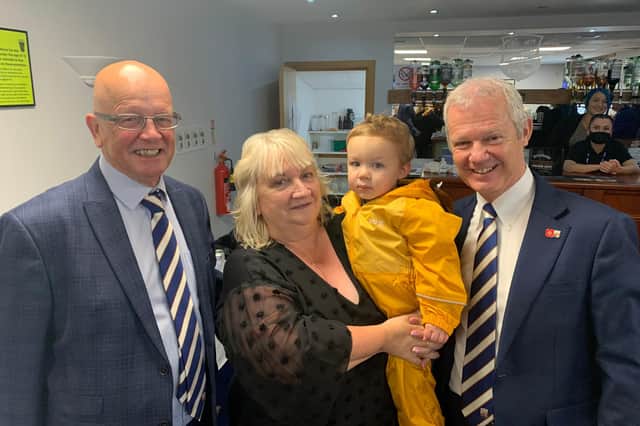 Club chairman John Crawford (left), is pictured with chief executive Peter Stuart, who presented Anne and grandson Alan with a thank you gift.