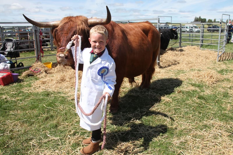 Six-year-old Cohen Neil, from Panbride Livestock, who was proud as punch to receive second place with his Highland Cow, The Colonel.