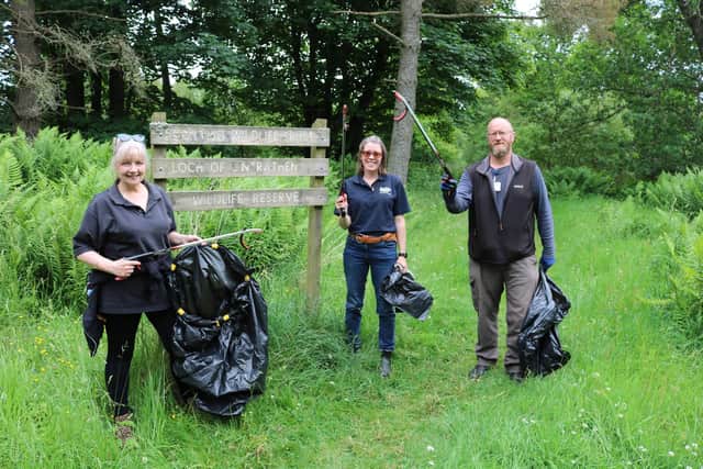 Councillor Julie Bell with Scottish Water employees Julianne Robertson and Graham Skea on the litter pick at Loch of Lintrathen.