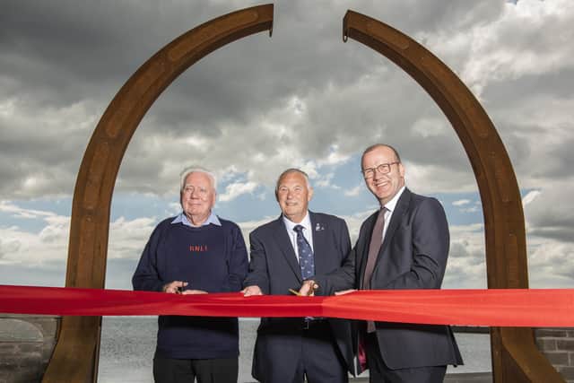 Pictured (l-r) Robin Smith; Dave Martin, Broughty Ferry Lifeboat Station president and Mark Flynn from Dundee City Council. (Andy Thompson)