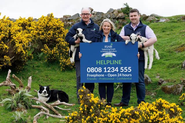 David Leggat, Chair of RSABI, is pictured with Chris McVey, RSABI Welfare Manager, and Lorraine Caven of RSABI with the new Helpline number.