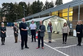 Dr Scott Jamieson (left) and Dr David Shaw, Associate Medical Director for Primary Care with members of the team.