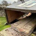 ​The fallen Aberlemno 3 surrounded by the protective box. Concerns had recently been raised about the stability of the structure. (Contributed)
