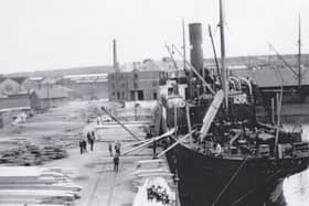 ​A steamship berthed in the Wet Dock in the heyday of the timber trade.