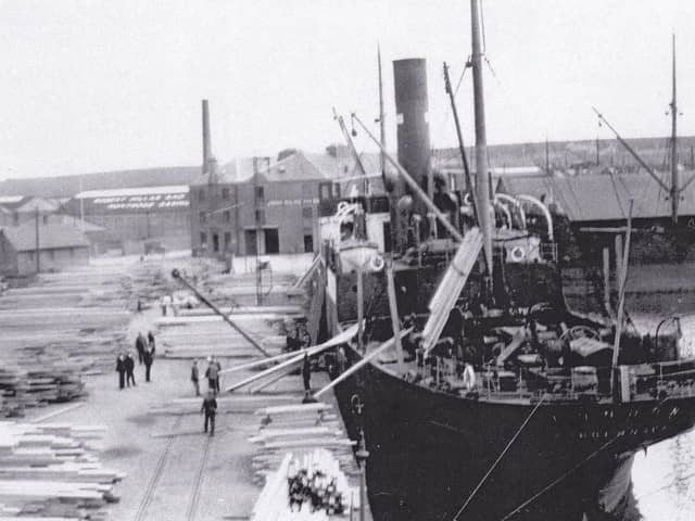 ​A steamship berthed in the Wet Dock in the heyday of the timber trade.