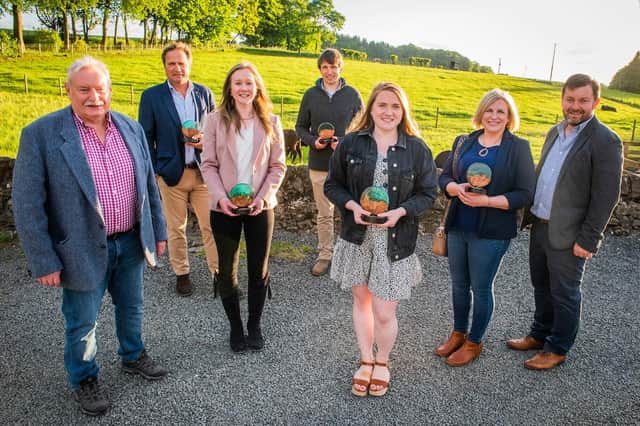 Wayne Powell, SRUC, is pictured with award winners.