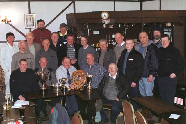 Pictured are the members who attended Rescobie Fishing Club's prize-giving in March, 2002.