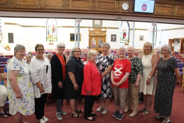 The organising team are pictured with guests.