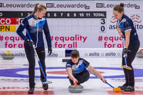 Hailey Duff delivers her stone at the Olympic qualification event in Leeuwarden, guided on the left by Forfar’s Vicky Wright. Pic by WCF / Steve Seixeiro