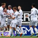 Montrose celebrate Michael Gardyne's goal during their 3-0 win at Falkirk on Saturday. Pic by Michael Gillen