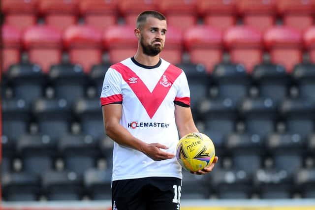14-08-2021. Picture Michael Gillen. FALKIRK. One year and 143 days of UK wide coronavirus restriction measures. Day 6 of almost no restrictions. Scotland is now below Level zero, Level 0. AIRDRIE. Excelsior Stadium. Airdrieonians FC v Falkirk FC. Season 2021 - 2022. Matchday 3. SPFL cinch League One. Airdrie v Falkirk. A deflated Craig Watson 16.