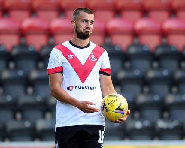14-08-2021. Picture Michael Gillen. FALKIRK. One year and 143 days of UK wide coronavirus restriction measures. Day 6 of almost no restrictions. Scotland is now below Level zero, Level 0. AIRDRIE. Excelsior Stadium. Airdrieonians FC v Falkirk FC. Season 2021 - 2022. Matchday 3. SPFL cinch League One. Airdrie v Falkirk. A deflated Craig Watson 16.
