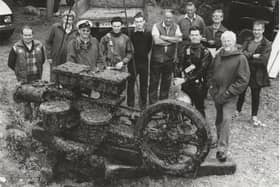 The moment a steam pump was landed on solid ground after being underwater in the Border Hole (near Friockheim) for many years. Royal Naval divers were involved. Pictured were, from left - Alexander Watt, John Watson, John Whip, Steve Dye, John Harris, Jim Anderson, Jim Wallace, Jim Geddes, Bill Gerrard, Fred Cooper and Bade Curtis.