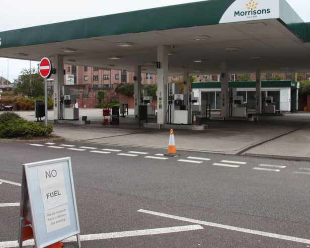 Some petrol stations ran out of fuel entirely as motorists queued to fill up. (Wallace Ferrier)