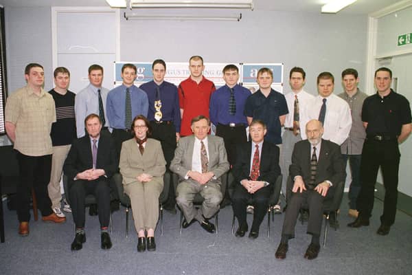 ​A group of young engineers from Angus and Dundee became the first Engineering Modern Apprentices to complete their training in Tayside. To mark the occasion, a formal graduation was held in Angus Training Group, Arbroath. Pictured with the lads were (l-r) seated - John Berry, Scottish Enterprise Tayside; Debbie Foster, Engineering Learning Link; Cameron Braidwood, chairman, ATG; Bert Smith, chairman and MD, Merpro Group and Jim Thomson, ATG.
