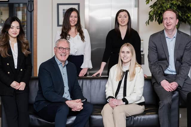 Aimee Young (back left) is pictured with the company’s new starts for its Dundee, St Andrews and Perth offices.
