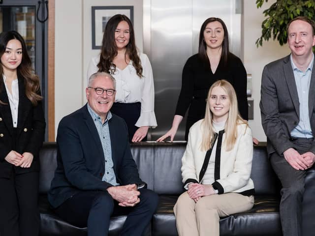 ​Aimee Young (back left) is pictured with the company’s new starts for its Dundee, St Andrews and Perth offices.