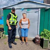 ​PC Ronnie Irvine is pictured with garden co-founder Laura Tierney.