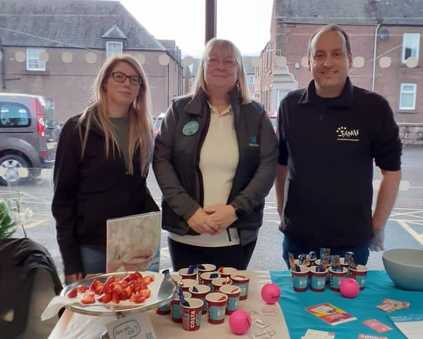 ​SAMH representatives are pictured with Co-op staff during the Kirriemuir drop-in session.
