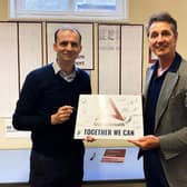 ​Mr Gethins is pictured at Arbroath Library with town board chairman Peter Stirling.