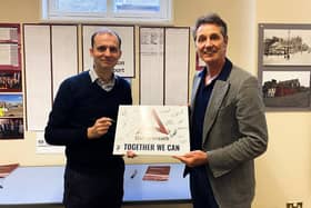 ​Mr Gethins is pictured at Arbroath Library with town board chairman Peter Stirling.