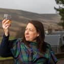 ​Bothy Trading founder Kim Cameron with some of the company’s Gunshot Whisky.