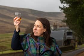 ​Bothy Trading founder Kim Cameron with some of the company’s Gunshot Whisky.