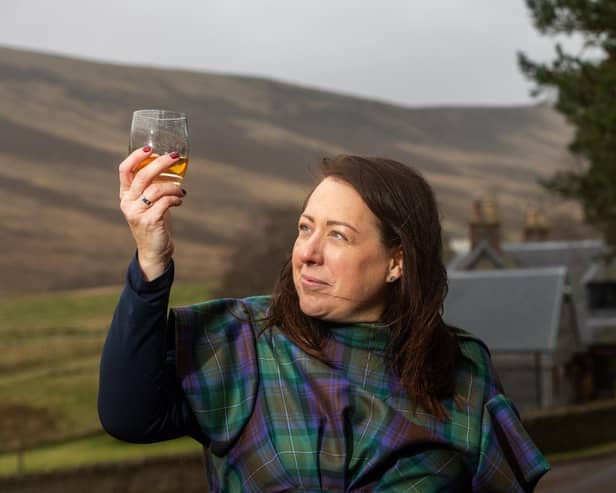 ​Bothy Trading founder Kim Cameron with some of the company’s Gunshot Whisky.