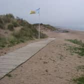 Dune repair work is urgently required to reduce flood risk.