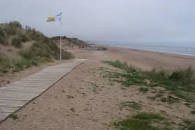 Dune repair work is urgently required to reduce flood risk.