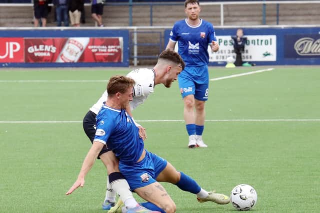 Blair Lyons puts in a tackle in the win over Queen of the South (pic: Phoenix Photography)