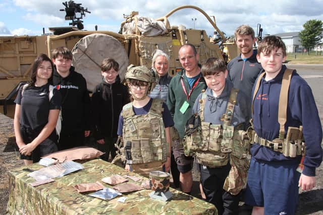 Pupils from Websters and Monifieth try the contents of a field ration pack.